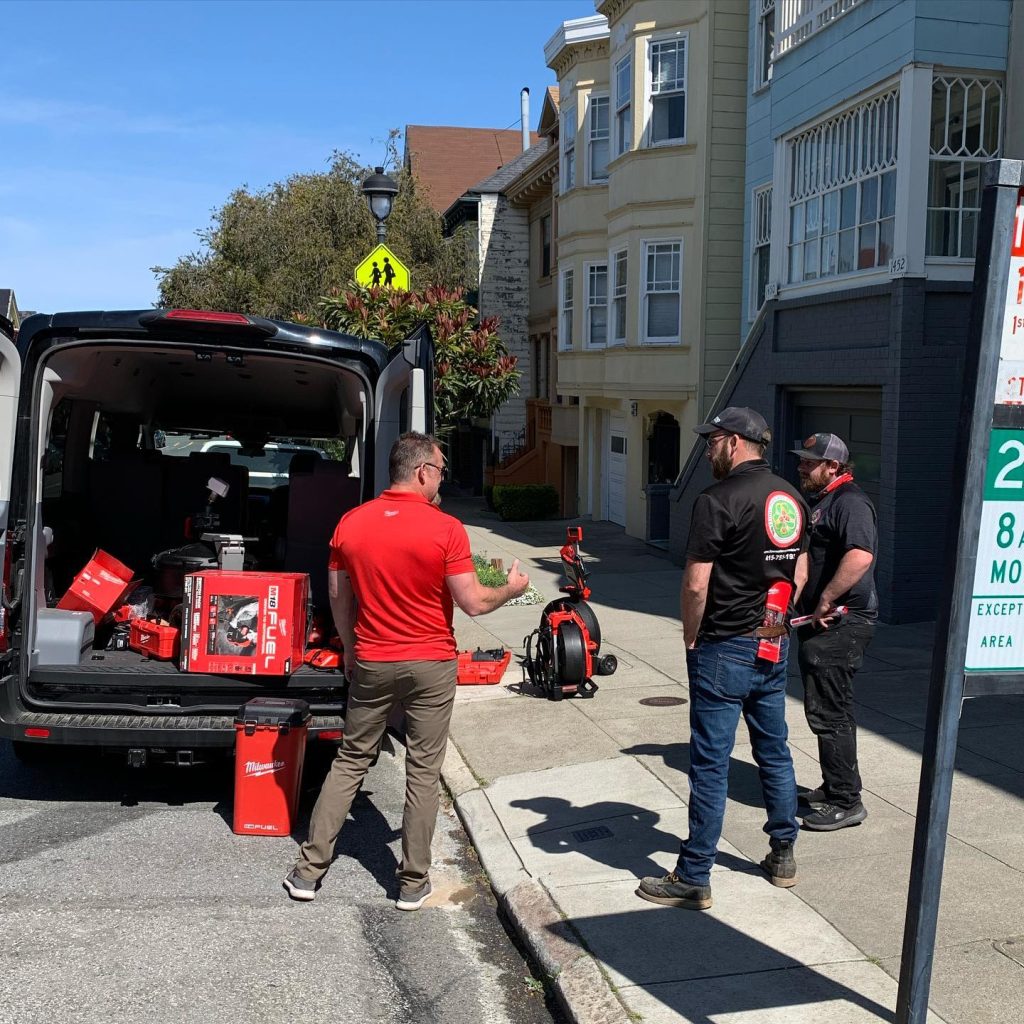 Technicians from Flow Masters rolling out their drain cleaning tools
