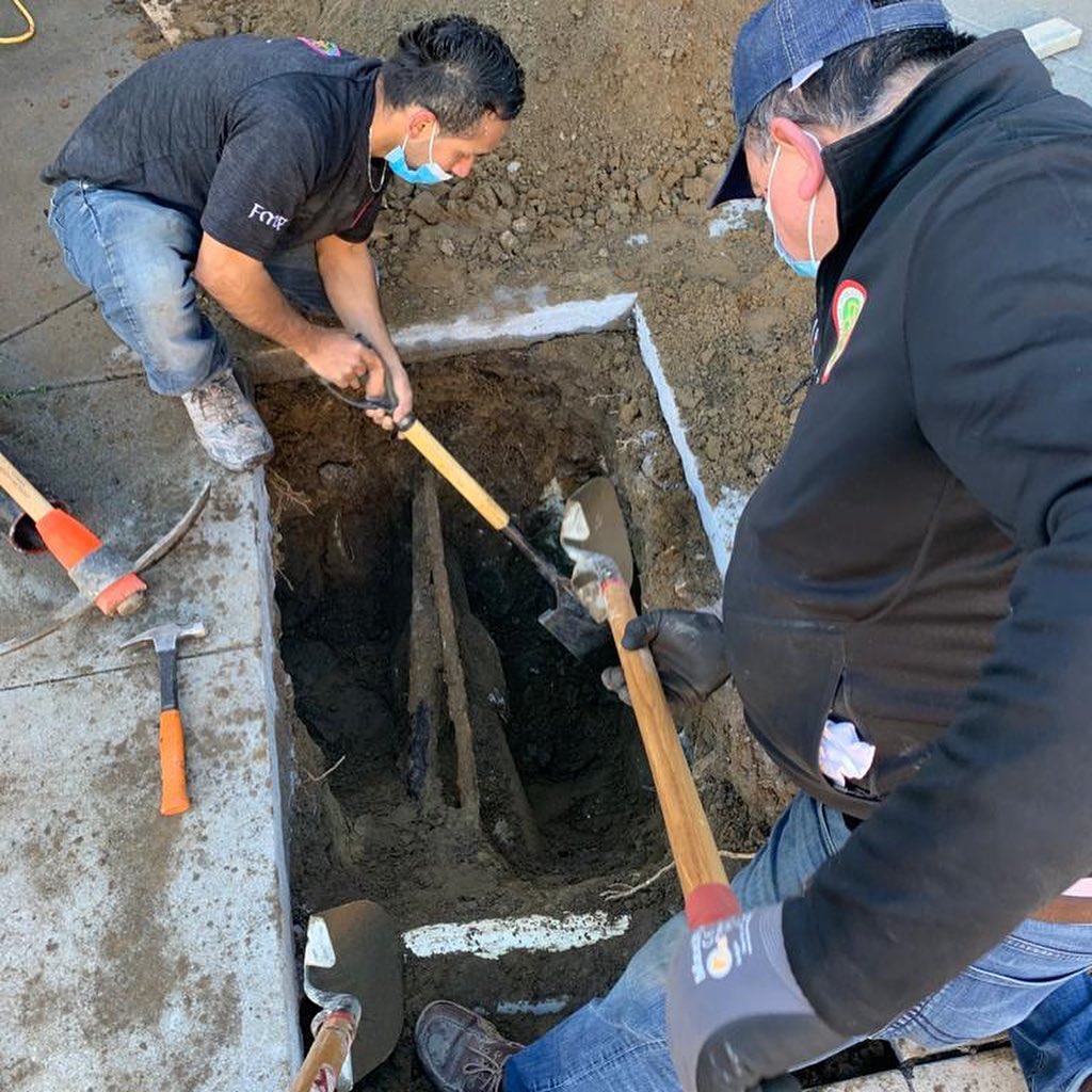 Plumbers in San Bruno in the middle of a sewer repair job.