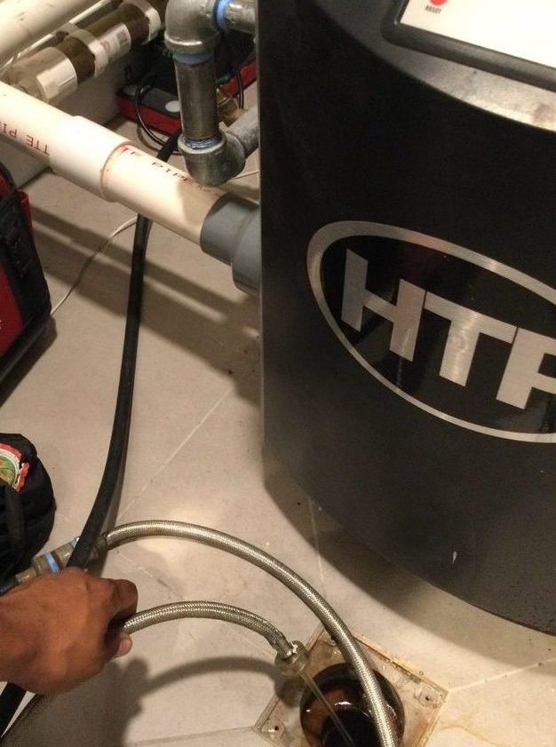 removing mineral deposits (scale) that build up inside the boiler over time