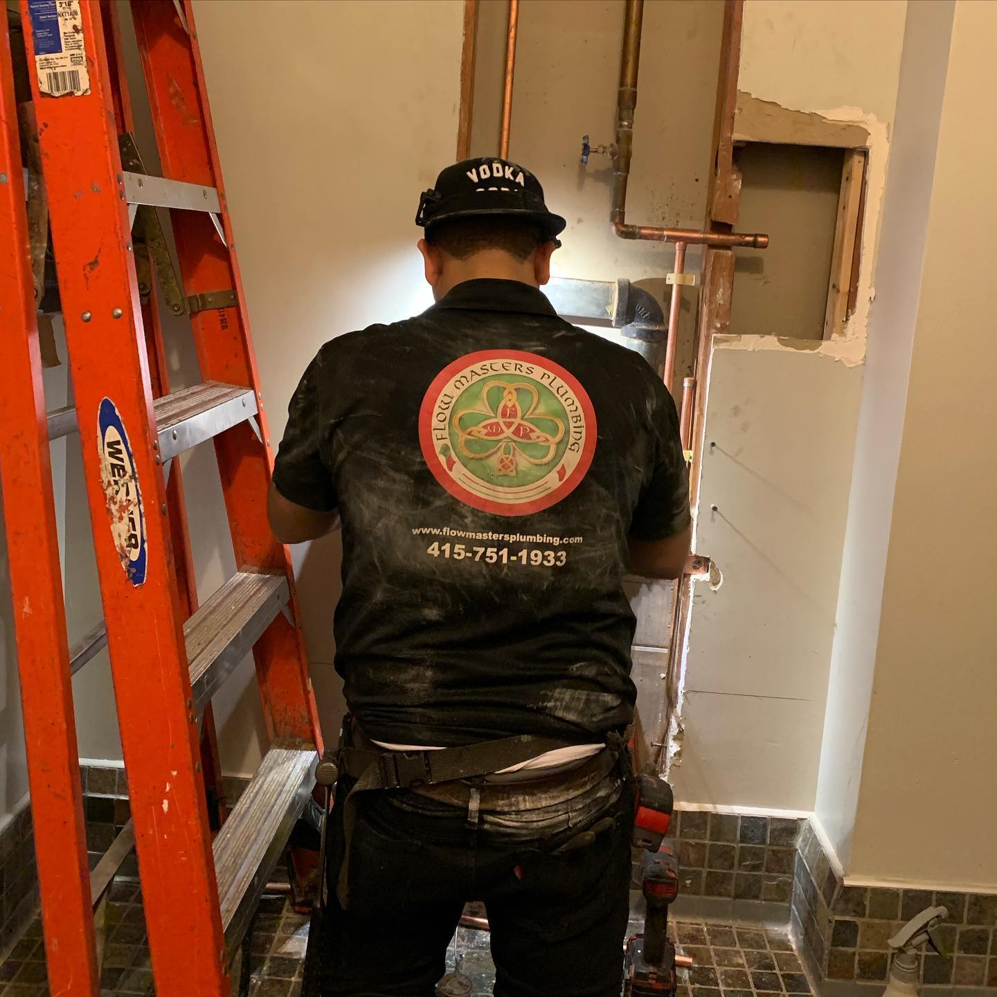 A Flow Masters’ plumber working on a replacement project.